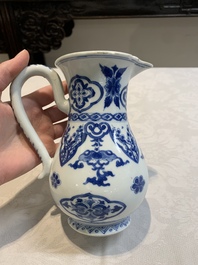 A Chinese blue and white jug with floral design, Kangxi