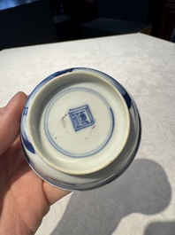 Two Chinese blue and white cups and saucers, Kangxi/Yongzheng