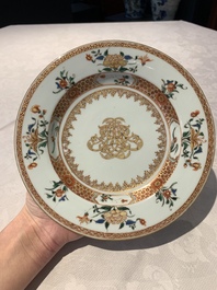 A pair of Chinese armorial monogrammed plates and a famille rose plate, Kangxi/Yongzheng