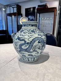 A fine Chinese blue and white 'dragon' vase with mythical-beast-shaped handles, probably Yuan