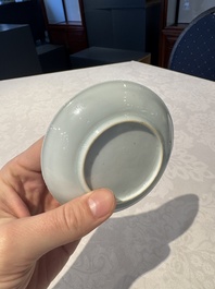 Two Chinese blue and white cups and saucers, Kangxi/Yongzheng