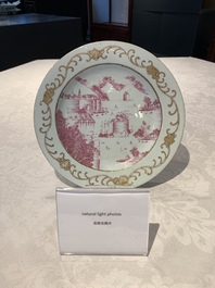 A Chinese puce-enamelled and gilt-decorated 'harbour scene' plate, Qianlong