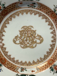 A pair of Chinese armorial monogrammed plates and a famille rose plate, Kangxi/Yongzheng