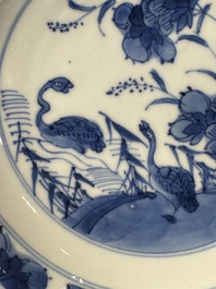 Two Chinese blue and white cups and saucers, Kangxi/Yongzheng