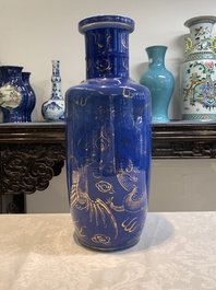 A Chinese gilt-decorated powder-blue 'dragon and phoenix' rouleau vase, 19th C.