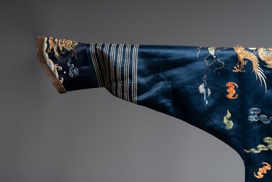 A Chinese gold-thread-embroidered blue-ground silk 'dragon' robe, 18/19th C.