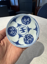Two Chinese blue and white cups and saucers, Kangxi/Yongzheng