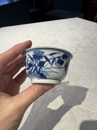 Two Chinese blue and white cups and saucers, Kangxi/Yongzheng
