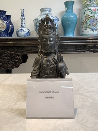 A Chinese bronze seated Guanyin, Ming
