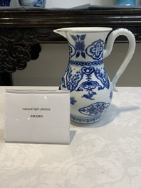 A Chinese blue and white jug with floral design, Kangxi
