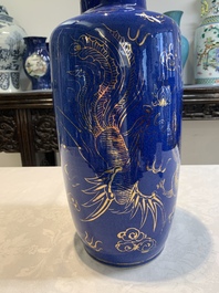 A Chinese gilt-decorated powder-blue 'dragon and phoenix' rouleau vase, 19th C.