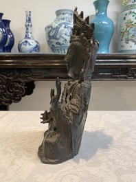 A Chinese bronze seated Guanyin, Ming