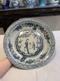 A Chinese Swatow blue and white 'lady and a boy' dish, Ming