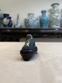 A Chinese blue-glazed Yixing stoneware 'lotus' bowl, and a brush rest on wooden stand, 18/19th C.