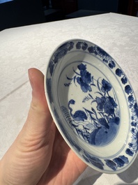 Two Chinese blue and white cups and saucers, Kangxi/Yongzheng