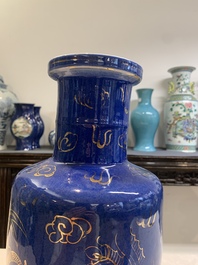 A Chinese gilt-decorated powder-blue 'dragon and phoenix' rouleau vase, 19th C.
