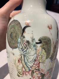 A Chinese famille rose 'deities' vase, Qianlong mark, 19/20th C.