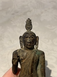 A Sinhalese copper alloy figure of Buddha Shakyamuni, Sri Lanka, late Kandyan period, 18th C.