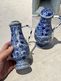 A pair of Chinese blue and white jugs and covers with floral design, Kangxi