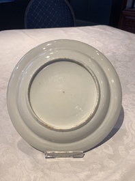 A pair of Chinese Canton famille rose armorial plates, 19th C.