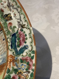 A pair of Chinese Canton famille rose armorial plates, 19th C.