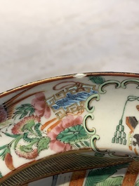 A pair of Chinese Canton famille rose armorial plates, 19th C.