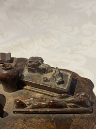 A Chinese agarwood carving of a miniature table with antiquities, 18/19th C.