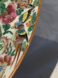 A pair of Chinese Canton famille rose armorial plates, 19th C.