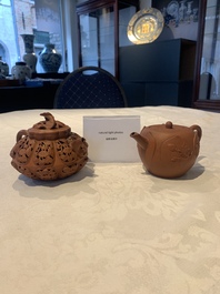 A Chinese Yixing stoneware reticulated double-walled teapot and a teapot with floral relief design, Kangxi