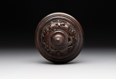 A Chinese blue and white vase with floral design and wooden cover, Transitional period