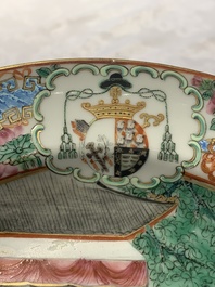 A pair of Chinese Canton famille rose armorial plates, 19th C.