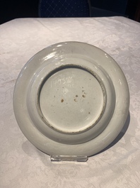 A pair of Chinese Canton famille rose armorial plates, 19th C.