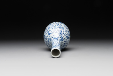 A Chinese blue and white 'lotus scroll' bottle vase, Yongzheng mark, 19/20th C.