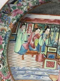 A pair of Chinese Canton famille rose armorial plates, 19th C.