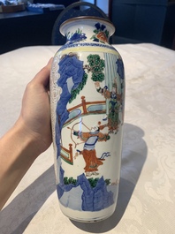 A pair of Chinese wucai 'Romance of the Three Kingdoms' rouleau vases, 19th C.