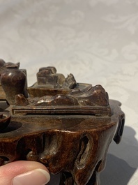 A Chinese agarwood carving of a miniature table with antiquities, 18/19th C.