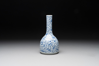 A Chinese blue and white 'lotus scroll' bottle vase, Yongzheng mark, 19/20th C.