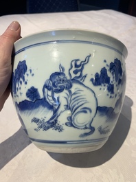 A Chinese blue and white 'Buddhist lion and elephant' scroll jar or jardini&egrave;re, Transitional period