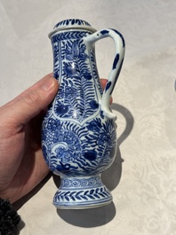 A pair of Chinese blue and white jugs and covers with floral design, Kangxi