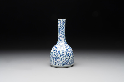 A Chinese blue and white 'lotus scroll' bottle vase, Yongzheng mark, 19/20th C.
