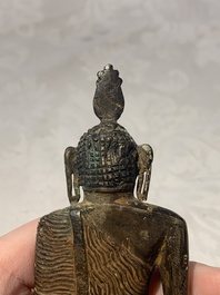 A Sinhalese copper alloy figure of Buddha Shakyamuni, Sri Lanka, late Kandyan period, 18th C.