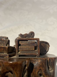 A Chinese agarwood carving of a miniature table with antiquities, 18/19th C.