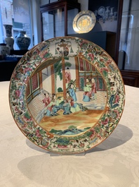 A pair of Chinese Canton famille rose armorial plates, 19th C.