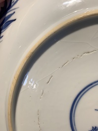 A Chinese blue, white and copper-red powder-blue-ground 'fish' dish, Kangxi