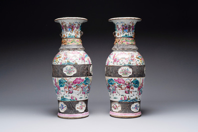 A pair of Chinese Nanking famille rose vases with narrative design, 19th C.