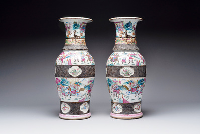 A pair of Chinese Nanking famille rose vases with narrative design, 19th C.