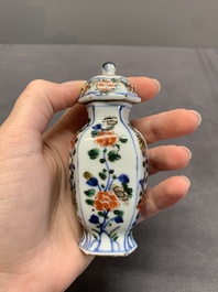 A rare Chinese famille verte garniture of five miniature vases with floral design, Kangxi