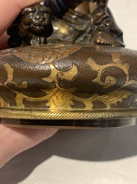 A fine Japanese gilt bronze vase and cover with the tiger taming Arhat, signed Akasofu Gyoko 曉光, Meiji, 19th C.