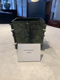 A Chinese archaic bronze ritual wine vessel, 'yi 彝', Shang