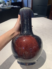 A Chinese flamb&eacute;-glazed bottle vase, 19th C.